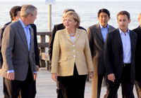 Georges Bush, Angela Merkel, Nicolas Sarkozy